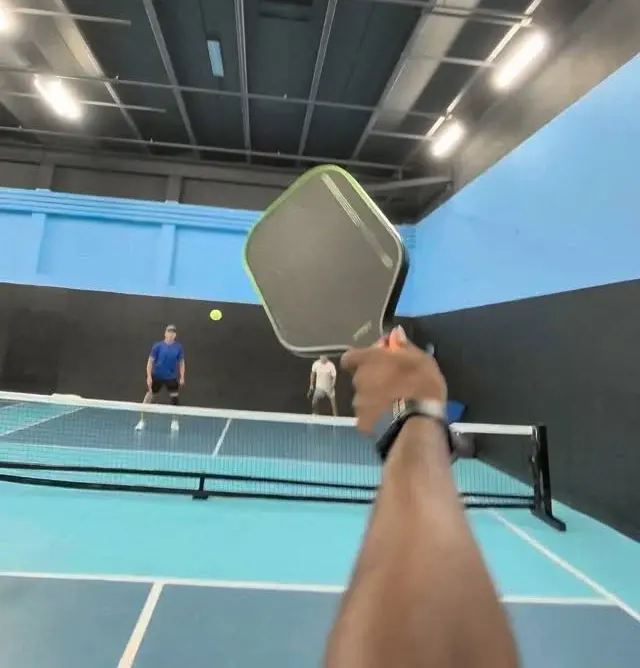 A view across a pickleball court during a game shared by Rob.